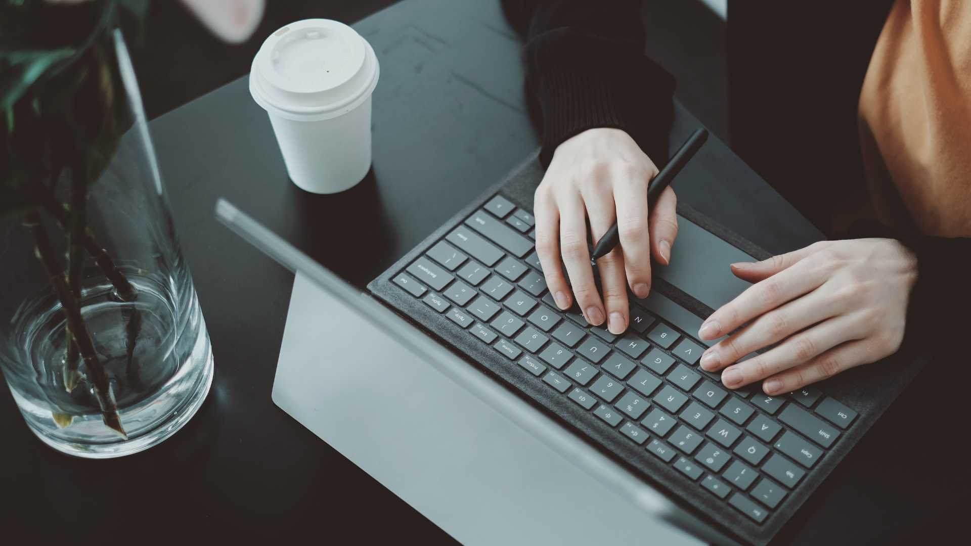 Lady Typing at desk