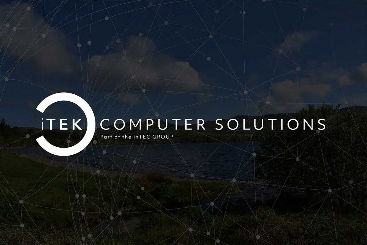 iTEK Computer Solutions logo overlayed on a scenic landscape background with a connected digital network graphic.
