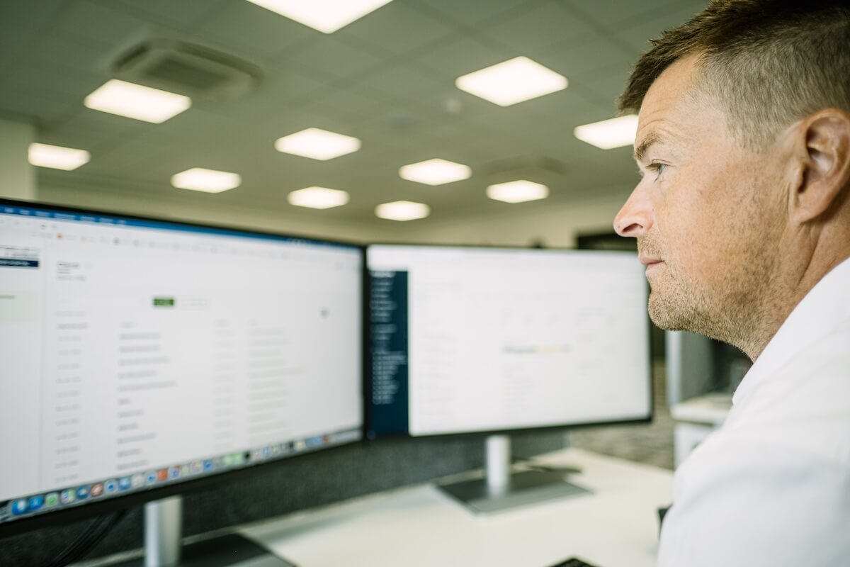 client working at computer